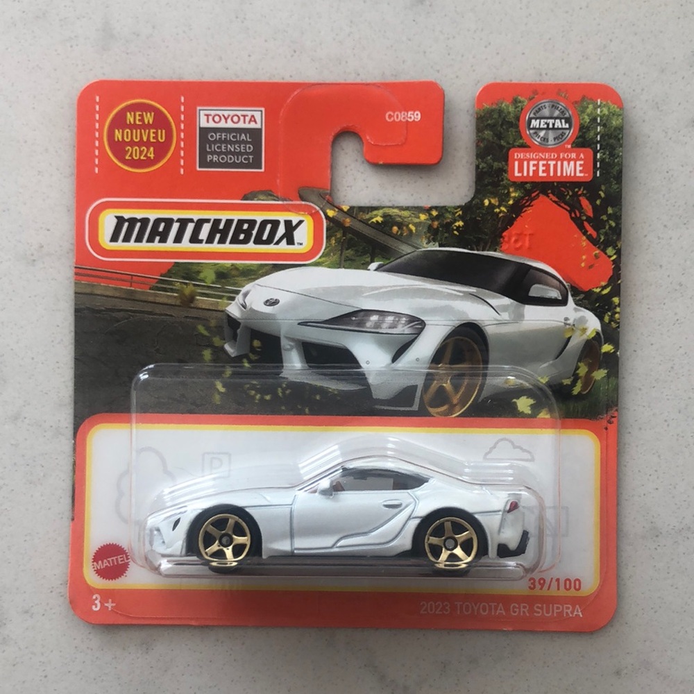 Matchbox 2023 Toyota GR Supra Toy Car - White and Gold